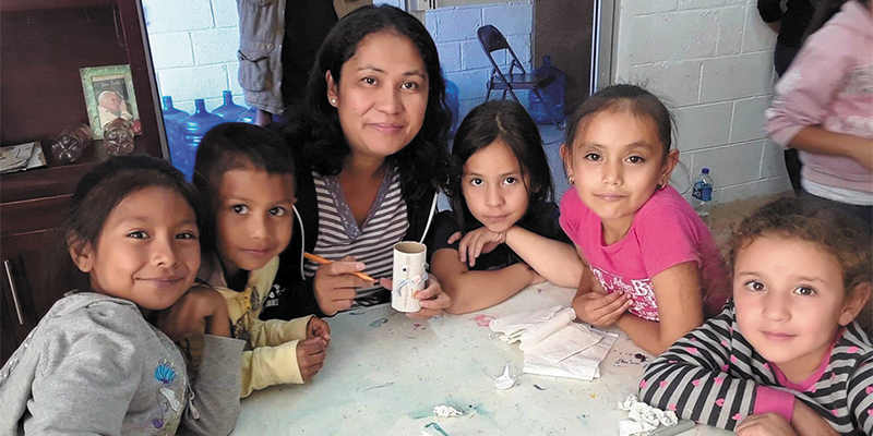 Rosalia working with children