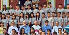 Fr. Neil Magill and Bishop Paul Grawng with HEC students in Myanmar.